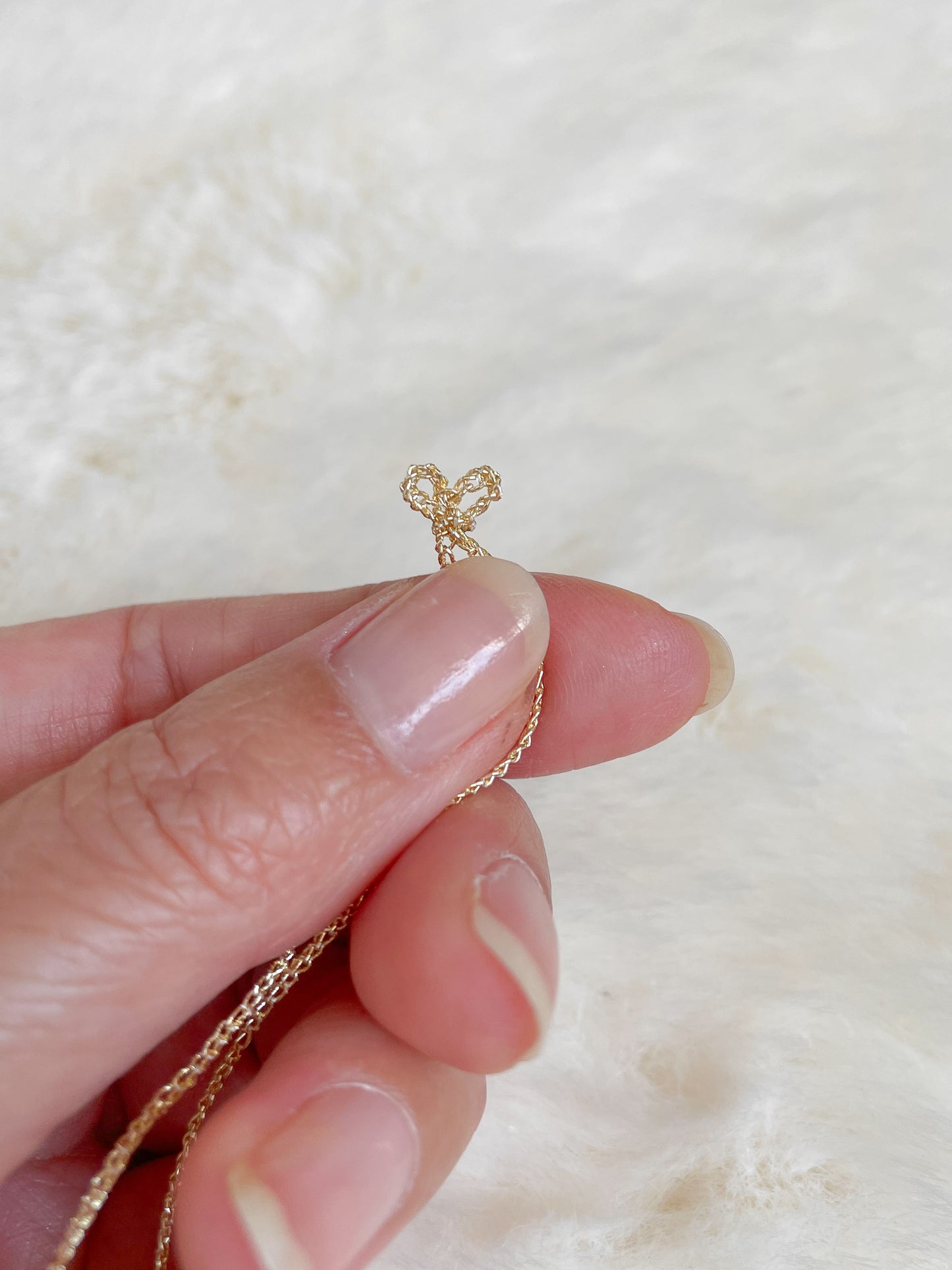 Signature Cindel Jewels hartje afsluiting ketting in hand