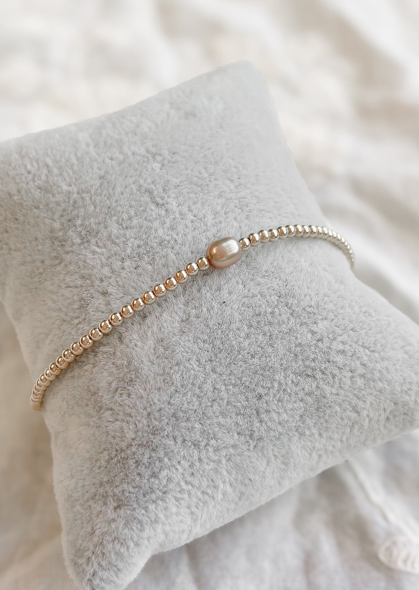 Oryn golden pearl armband